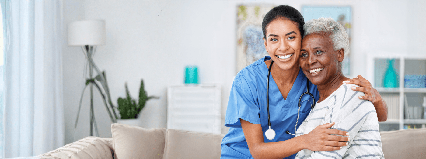 Compassionate caregiver assisting a senior resident